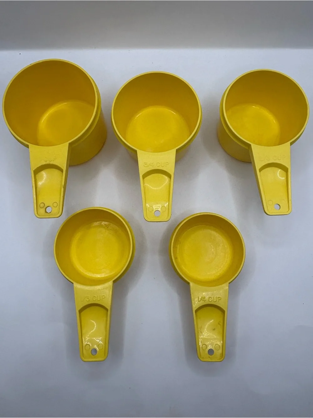 Tupperware Yellow Nesting Measuring Cups - Set of 5
